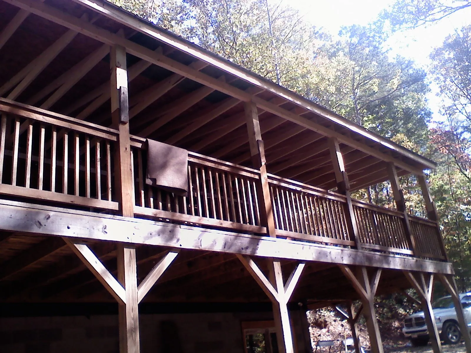 Timber framing under a new elevated porch and deck — Roof Leak Repair in Becket by Roofing Brothers
